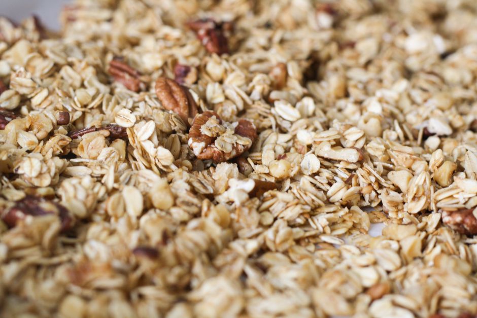 Close-up of homemade granola with crunchy oats and pecans, perfect for a healthy snack