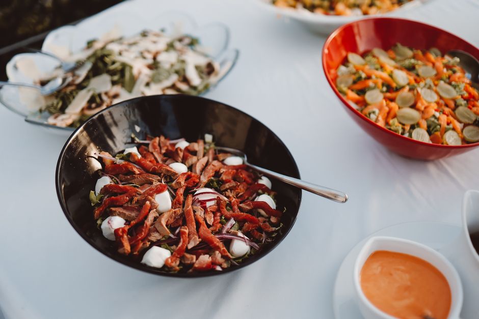 Assorted dishes spread out on a buffet table